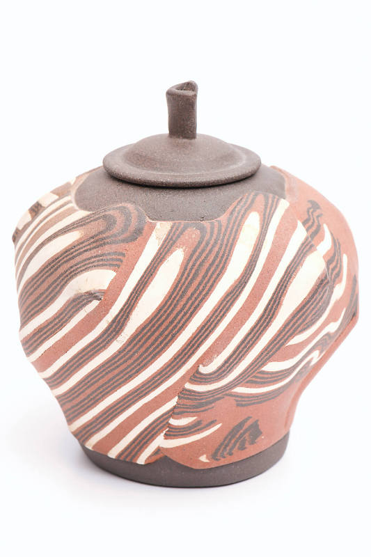 Title unknown (lidded vessel with swirls of brown, rust, and cream)