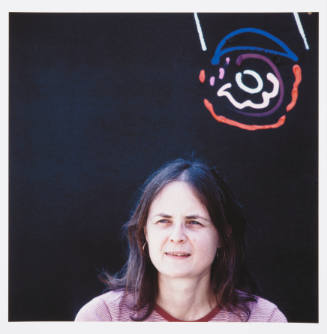 Margo Kren (painting professor, Kansas State University), in back of Kren home, Bertrand Street, Manhattan, Kansas, Spring 1982