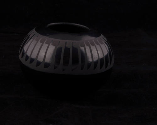 Title unknown (shiny black vessel with matte design)