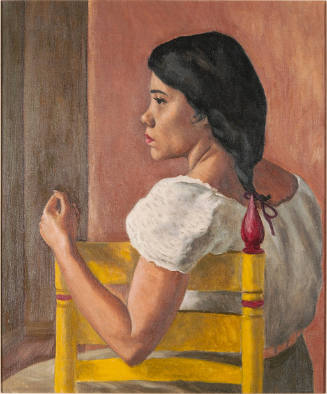 Indian girl in yellow chair