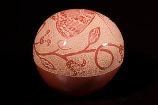 Carved redware jar