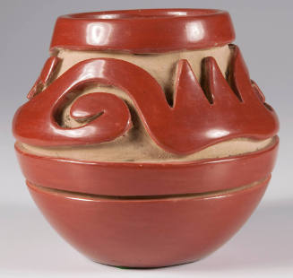 Carved redware jar