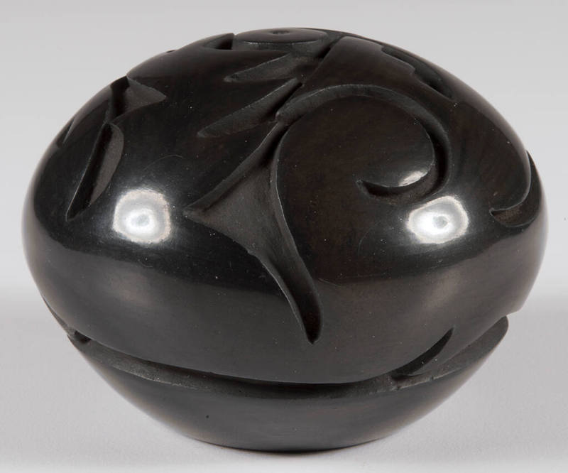 Carved blackware jar