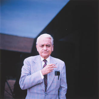 Howard Wooden (director, Wichita Art Museum), outside the museum, Wichita, Kansas, September 4, 1982