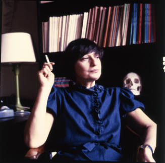 Mira Merriman (art history professor, Wichita State University) in her office, McKnight Art Center, WSU, October 1, 1983