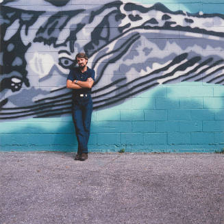 Reuben Saunders (owner, Reuben Saunders, Gallery), outside gallery, Washington Street, Witchita, Kansas, September 4, 1980