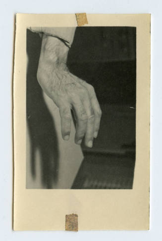 Hand hovering above a table
