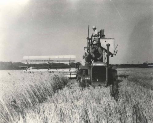 Tractor and Combine, Harvesting near Independence, Kansas