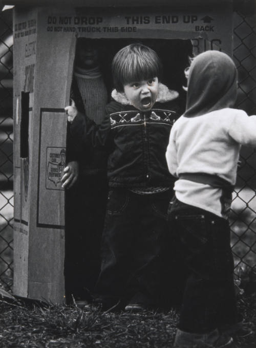 Pete Souza, title unknown (preschool child yelling in doorway made from a cardboard box), 
ca.…