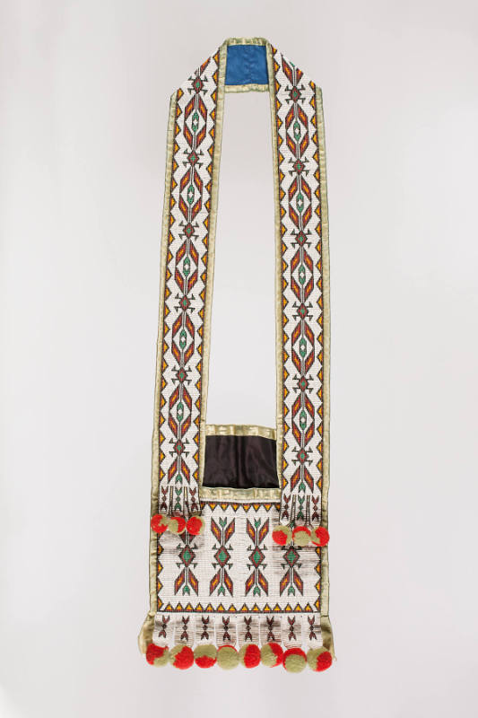 Bandolier bag with pompons