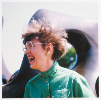 Novelene Ross (curator of education, Wichita Art Museum), in front of the museum, September 4, 1982