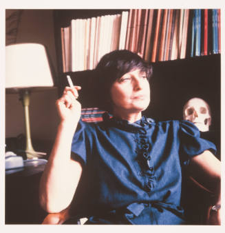 Mira Merriman (art history professor, Wichita State University) in her office, McKnight Art Center, WSU, October 1, 1983