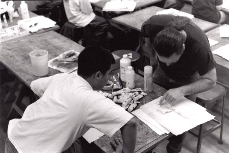 In the watercolor class taught in Willard Hall Roger Routson helps his students to create some ideas of what to do next.