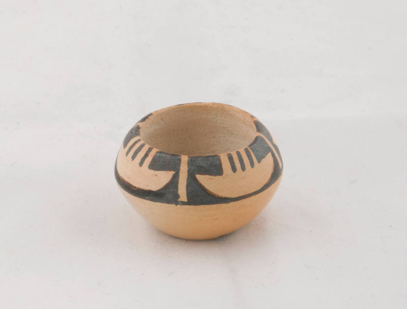 Small white bowl with boat design