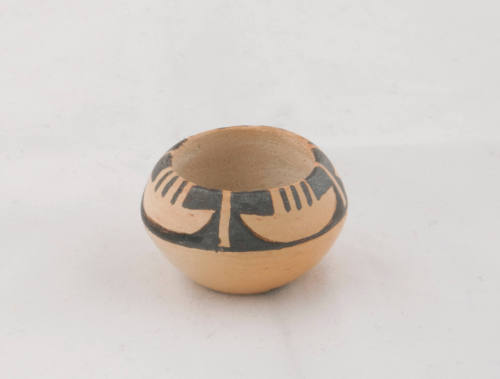 Small white bowl with boat design