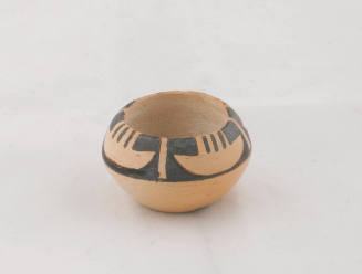 Small white bowl with boat design