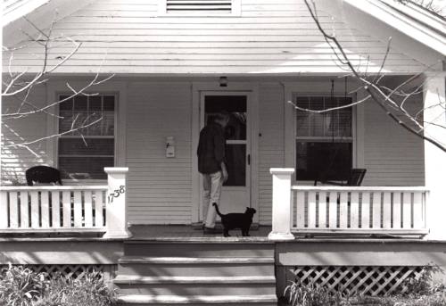 James Munce was entering his house to go to the basement where his studio is to work on his lithographs. Munce said this was on of his hobbies. Landscape of James Munce's life.