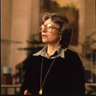 Title unknown (woman with glasses and gold necklace)