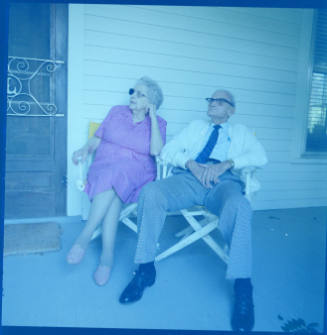 Elizabeth "Grandma" (artist) and Glenn Layton (artist's spouse) front porch of their home, 3rd Street, Wellsville, Kansas, August 22, 1989