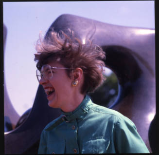 Novelene Ross (curator of education, Wichita Art Museum), in front of the museum, September 4, 1982