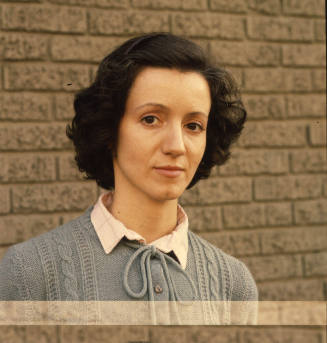 Elizabeth Kirsch (art critic, Kansas City Star) in front of Douglas Drake Gallery, Kansas City, Kansas, July 9, 1980