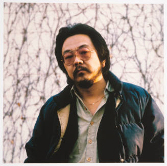 Roger Shimomura (artist, painting professor, Universiy of Kansas), back of Kren home, Bertrand Street, Manhattan, Kansas, March 5, 1981
