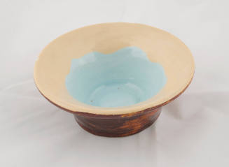 Yellow, blue, and brown ceramic bowl