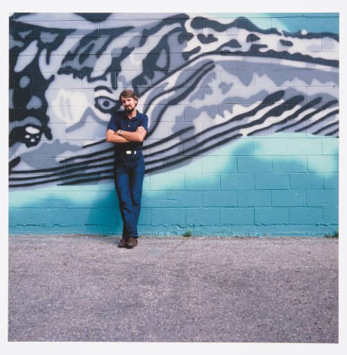 Reuben Saunders (owner, Reuben Saunders, Gallery), outside gallery, Washington Street, Wichita, Kansas, September 4, 1980