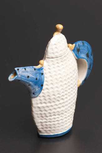 Title unknown (white teapot with blue spout and handle)